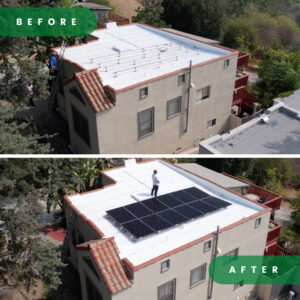 Home Upgrade Specialist installer standing on a roof, showcasing the completed solar panel installation.